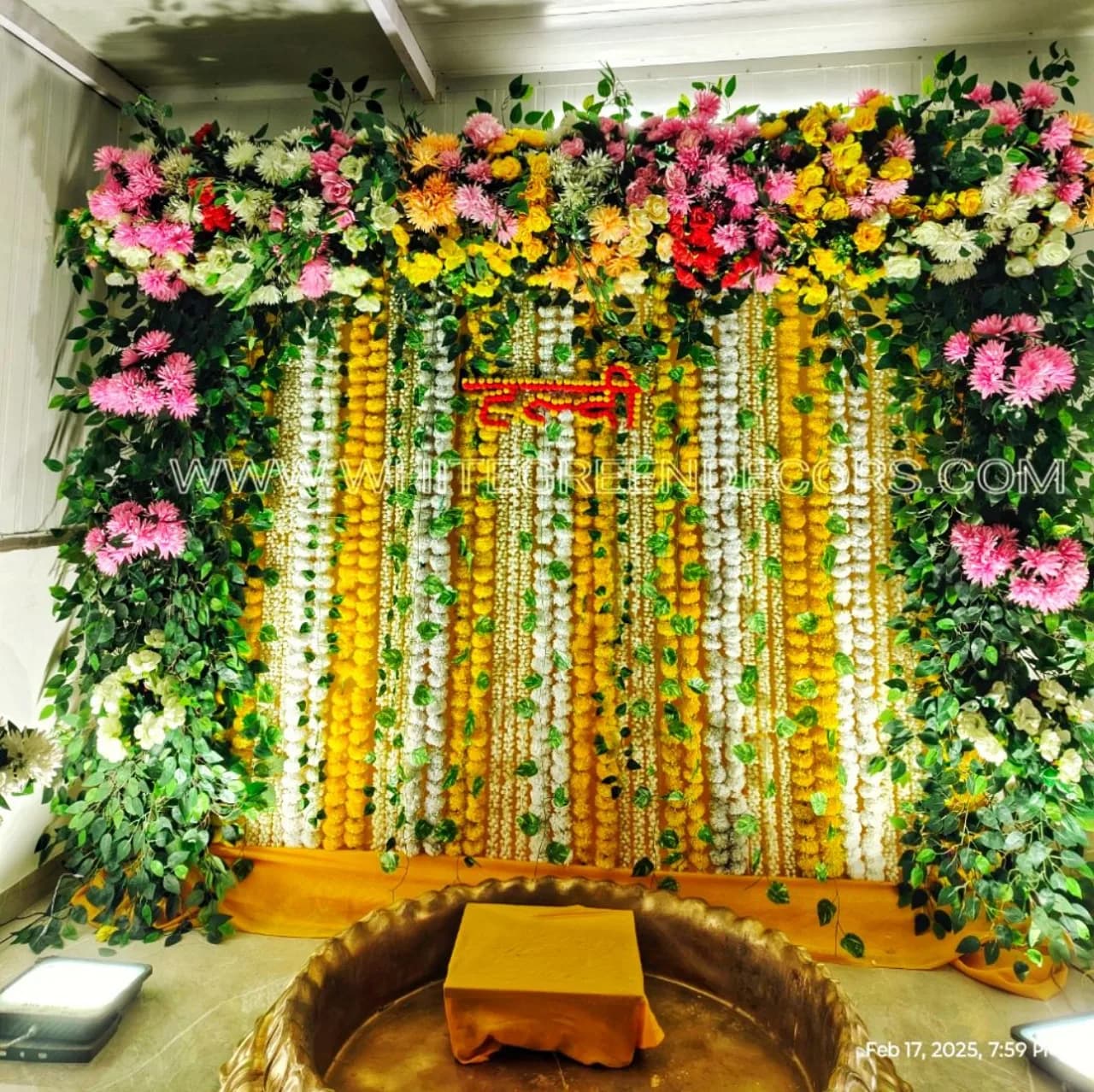 Floral Haldi Tub Decoration Setup with Hanging Garlands