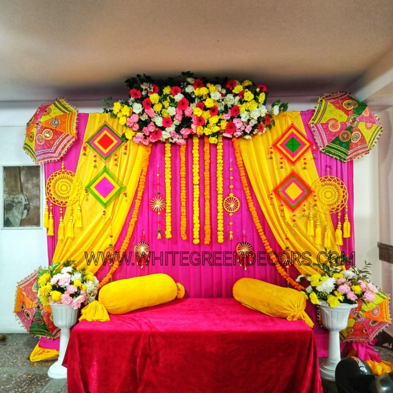 Vibrant Pink & Yellow Mehndi Lounge Decoration Setup