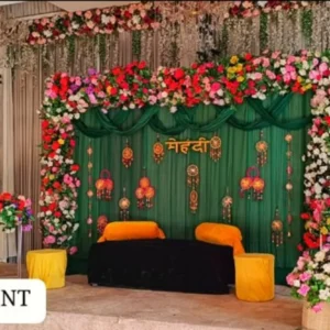 Classic Mehandi Stage Decoration – Green Backdrop with Floral Borders